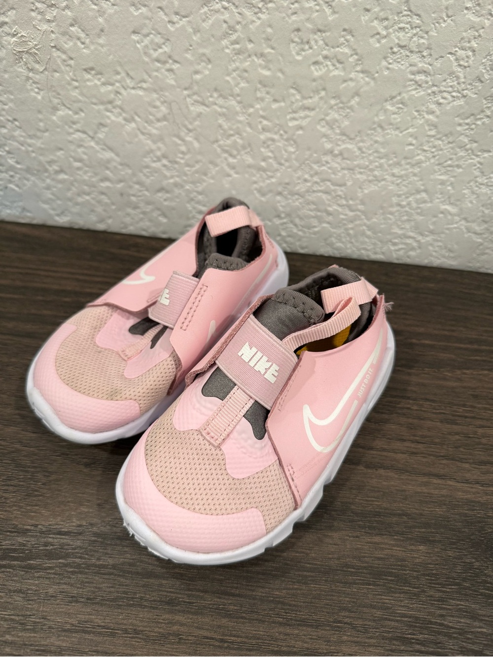 Nike Kids Pink and Gray Slip-On Athletic Sneakers